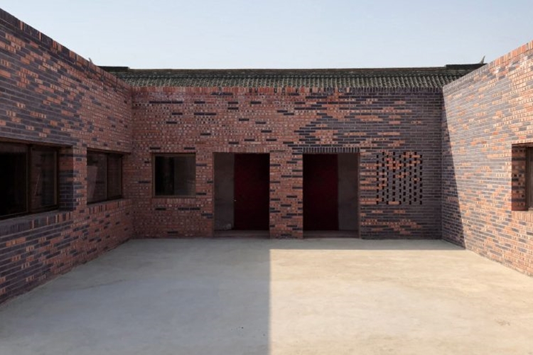 peach-house-frederic-schnee-architecture-residential-beijing-china-bricks_dezeen_hero-1-852x479.jpg