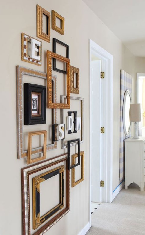 02-a-gallery-wall-of-mixed-empty-frames-and-monograms-looks-very-exquisite-and-adds-style.jpg