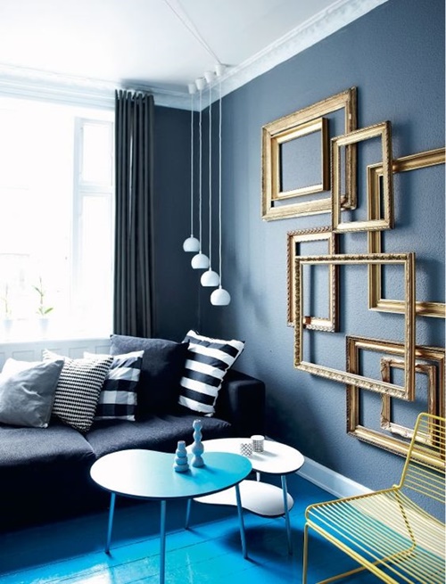04-add-a-refined-feel-to-your-living-room-easily-hanging-a-group-of-empty-frames.jpg