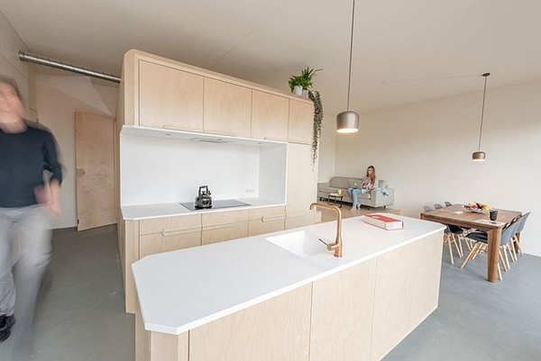 Birch-wood-and-white-Corian-kitchen-for-the-modern-home.jpg